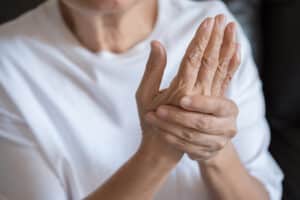 elderly woman and arthritis massage