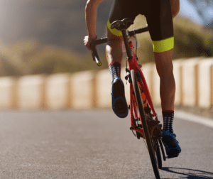 Person cycling with a healthy body